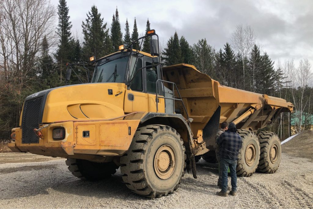 tri-axel articulated dump truck